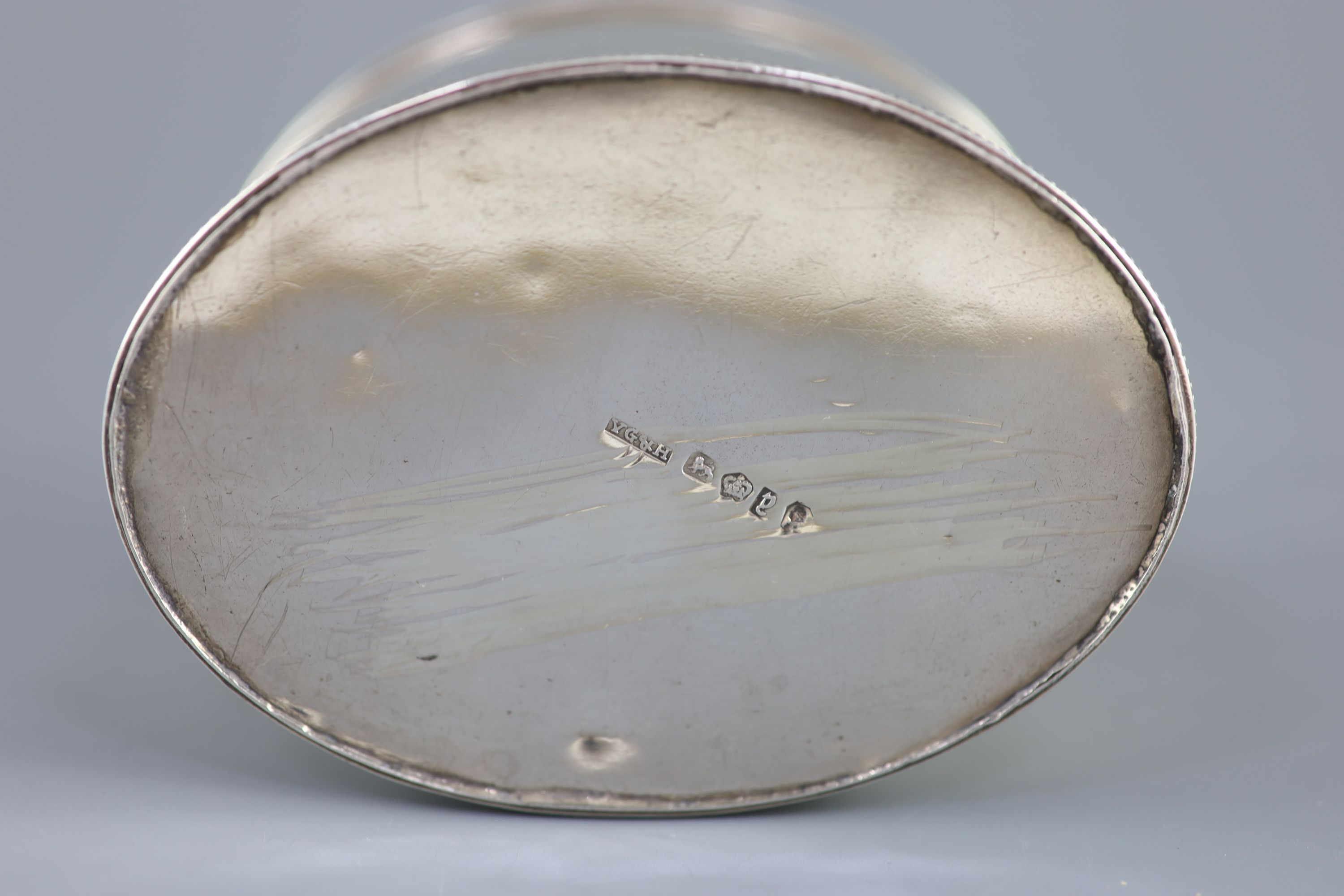 A George III silver oval tea caddy by John Younge & Co